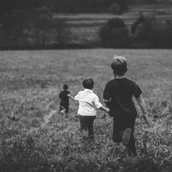 kids-running Kids Playing in a Field